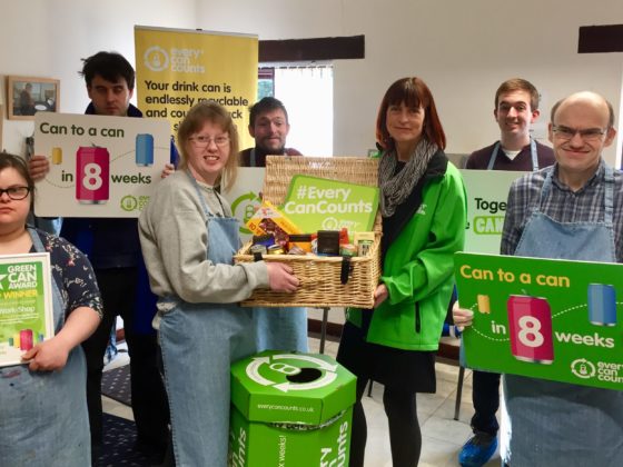 Photo of Eco-Workshop team being presented with a Green Can Award which is a national recycling reward presented by Every Can Counts.