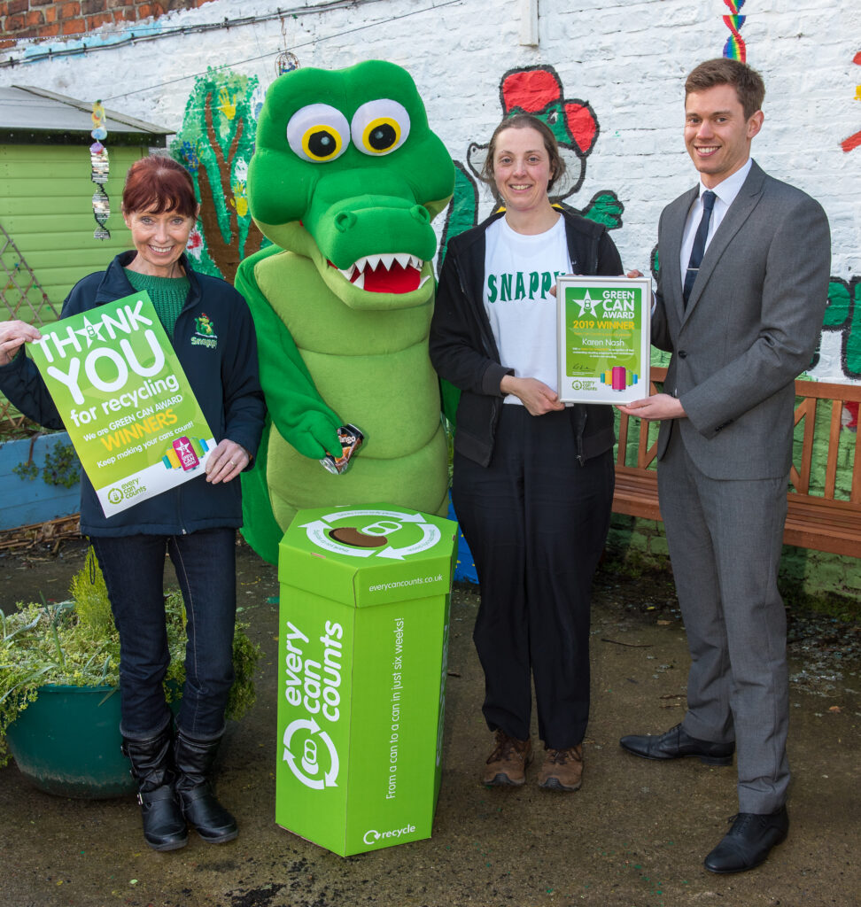 Karen and Anne from the York Recycling initiative, Foil for Snappy, are presented with an award by Every Can Counts. 